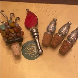 Set of (5) different wine corkers
